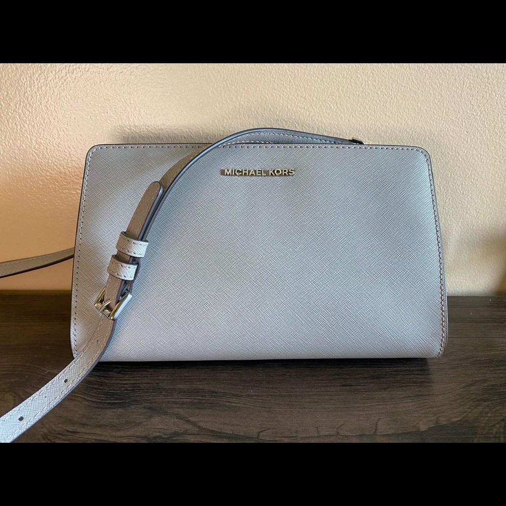 Large Micheal Kors Jet Set travel crossbody clutch